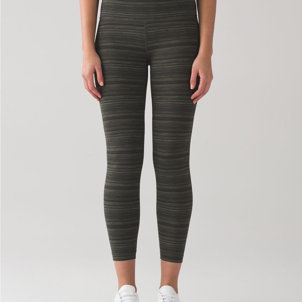 Wunderunder leggings. Tag removed. I think they are size 6. Green stripped.